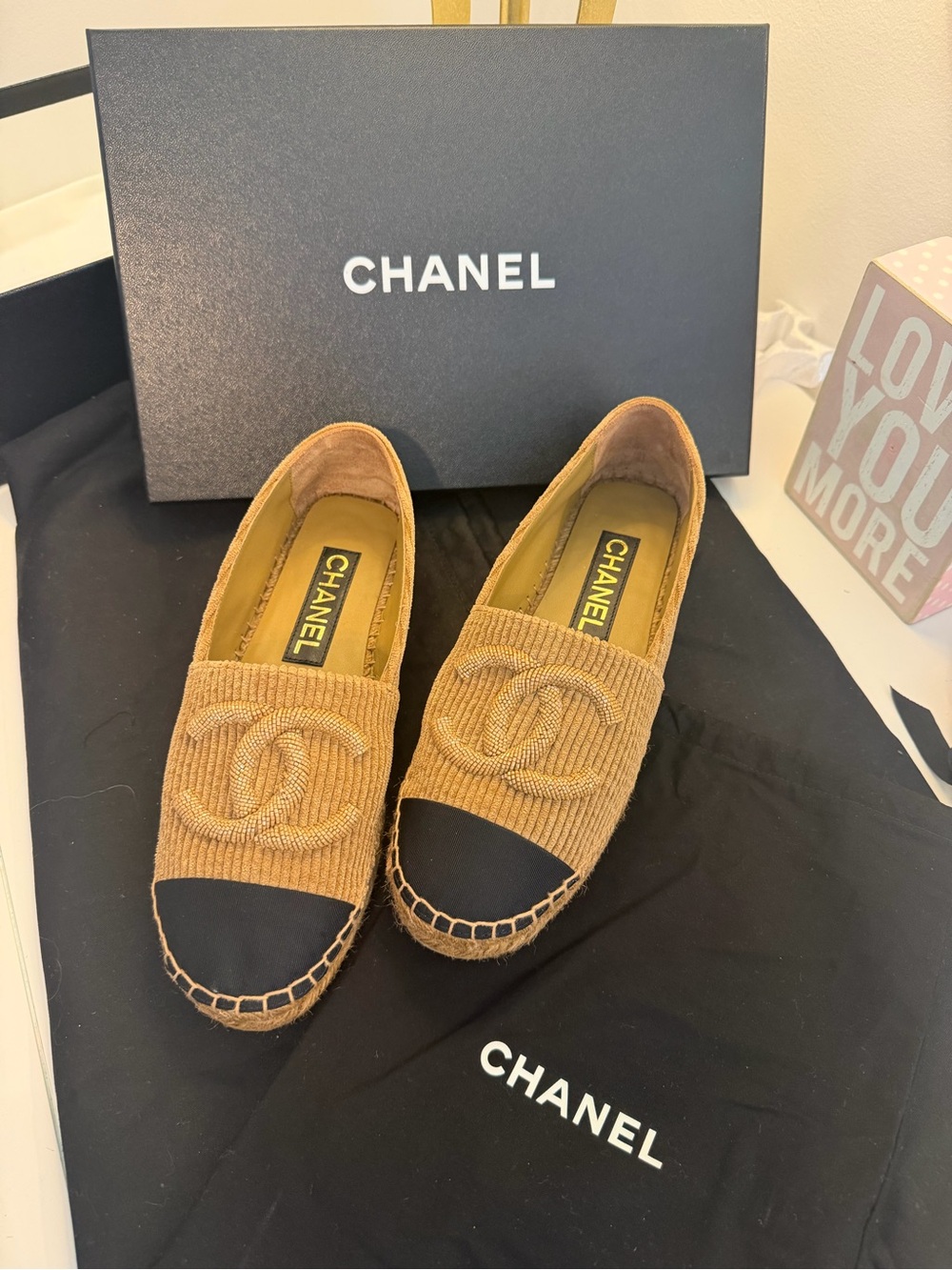 CHANEL Tan Espadrille Flats with Black Cap Toe and CC Logo (never worn)